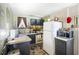 Galley kitchen with white appliances and dark cabinets at 2108 Ridge Church Rd # A & B, Summerville, SC 29486
