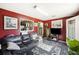 Living room with maroon walls and leather couches at 2108 Ridge Church Rd # A & B, Summerville, SC 29486