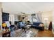 Living room with two sofas, coffee table, and a unique chalkboard accent wall at 2108 Ridge Church Rd # A & B, Summerville, SC 29486