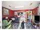 Living area with maroon walls and leather furniture at 2108 Ridge Church Rd # A & B, Summerville, SC 29486