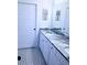 Bathroom with a double vanity and patterned floor at 25 Sheppard St, Charleston, SC 29403
