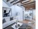 Virtually staged living room with open concept to kitchen at 25 Sheppard St, Charleston, SC 29403