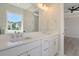Double vanity bathroom with quartz countertop and gold hardware at 2841 Auldreeke Rd, Johns Island, SC 29455