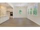 Bright dining area with hardwood floors and large windows at 2841 Auldreeke Rd, Johns Island, SC 29455