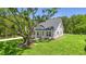 Charming house nestled amongst lush greenery and large trees at 2841 Auldreeke Rd, Johns Island, SC 29455