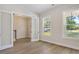 Light-filled office with hardwood floors and window views at 2841 Auldreeke Rd, Johns Island, SC 29455