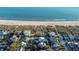 Aerial view of a beach house community, showing the property's location near the ocean at 3 43Rd Ave, Isle of Palms, SC 29451