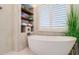 Bathroom with freestanding tub and walk-in shower at 3 43Rd Ave, Isle of Palms, SC 29451