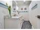 Clean bathroom with a vessel sink, white cabinetry, and blue trim at 3 43Rd Ave, Isle of Palms, SC 29451