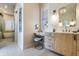 Elegant bathroom with double vanity and walk-in shower at 3 43Rd Ave, Isle of Palms, SC 29451