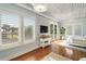 Main bedroom with hardwood floors and ocean views at 3 43Rd Ave, Isle of Palms, SC 29451