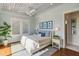 Serene bedroom with hardwood floors and coastal decor at 3 43Rd Ave, Isle of Palms, SC 29451