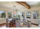 Elegant dining area with large windows and a view of the ocean at 3 43Rd Ave, Isle of Palms, SC 29451