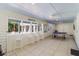 Covered patio with ping pong table and pool view at 3 43Rd Ave, Isle of Palms, SC 29451