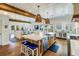 Spacious kitchen with island, stainless steel appliances, and hardwood floors at 3 43Rd Ave, Isle of Palms, SC 29451