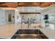 Modern kitchen with farmhouse sink, stainless steel appliances and open concept design at 3 43Rd Ave, Isle of Palms, SC 29451