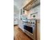 Stainless steel range and oven with white shaker cabinets and light tile backsplash at 3 43Rd Ave, Isle of Palms, SC 29451