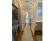 Convenient laundry room with washer, dryer, and built-in cabinets at 3 43Rd Ave, Isle of Palms, SC 29451