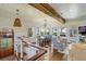 Open living space with hardwood floors, exposed beams, and scenic views at 3 43Rd Ave, Isle of Palms, SC 29451