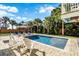 Inviting pool area with lounge chairs and a putting green at 3 43Rd Ave, Isle of Palms, SC 29451