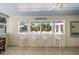 Outdoor bar area with a view of the pool and patio seating at 3 43Rd Ave, Isle of Palms, SC 29451