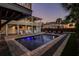 Inviting pool area with lounge chairs and a spacious patio at 3 43Rd Ave, Isle of Palms, SC 29451