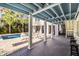 Large pool and patio with lounge chairs, providing ample space for relaxation and entertainment at 3 43Rd Ave, Isle of Palms, SC 29451