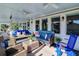 Relaxing covered porch with seating area, swing, and ocean views at 3 43Rd Ave, Isle of Palms, SC 29451