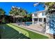 Landscaped backyard with a putting green and a refreshing pool at 3 43Rd Ave, Isle of Palms, SC 29451