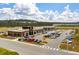 Aerial view of a shopping center anchored by a Texas Roadhouse at 307 Black Birch Dr, Summerville, SC 29486