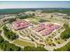 Aerial view of a large school campus with extensive parking at 307 Black Birch Dr, Summerville, SC 29486
