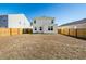 Fenced backyard with grassy area and home view at 307 Black Birch Dr, Summerville, SC 29486