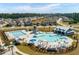 Aerial view of a community pool with cabanas and a playground at 307 Black Birch Dr, Summerville, SC 29486