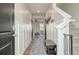 Bright entryway with wood floors, bench, and staircase at 307 Black Birch Dr, Summerville, SC 29486