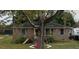 Brick ranch home with mature landscaping and a spacious yard at 310 Adeline Dr, Goose Creek, SC 29445