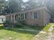 Charming brick home with well maintained landscaping and a classic aesthetic at 310 Adeline Dr, Goose Creek, SC 29445