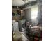 Functional laundry room featuring a sink and shelving at 310 Adeline Dr, Goose Creek, SC 29445