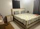 Inviting bedroom with a patterned quilt and contemporary decor at 310 Adeline Dr, Goose Creek, SC 29445