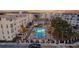 Aerial view of community pool and buildings at sunset at 320 Longshore Street St # 1044, Charleston, SC 29492