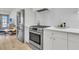 Sleek kitchen showcasing stainless steel appliances and white cabinetry at 320 Longshore Street St # 1044, Charleston, SC 29492