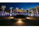 Circular water fountain at night with lights at 320 Longshore Street St # 1044, Charleston, SC 29492