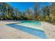 Clean, modern community pool with plenty of space for relaxation at 4240 William E Murray Blvd, Charleston, SC 29414