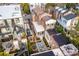 Aerial view showcasing home's private backyard oasis with patio and fountain at 43 Hasell St, Charleston, SC 29401