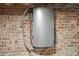 Basement with Enphase energy battery and brick walls at 43 Hasell St, Charleston, SC 29401