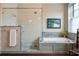 Spa-like bathroom with a glass shower and marble accents at 43 Hasell St, Charleston, SC 29401
