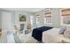 Bright bedroom with white bed and blue accents at 43 Hasell St, Charleston, SC 29401