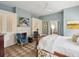 Spacious bedroom with a large bed, fireplace, and seating area at 43 Hasell St, Charleston, SC 29401