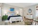 Charming bedroom with white bed and blue accents at 43 Hasell St, Charleston, SC 29401