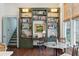 Built-in green shelving with a desk and seating area at 43 Hasell St, Charleston, SC 29401