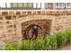 Brick alcove houses an electric vehicle charger at 43 Hasell St, Charleston, SC 29401